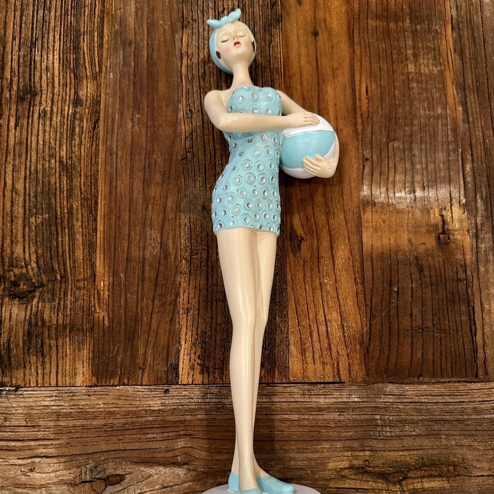 Elegant Figurine with Blue Accents - Picture 1 of 5